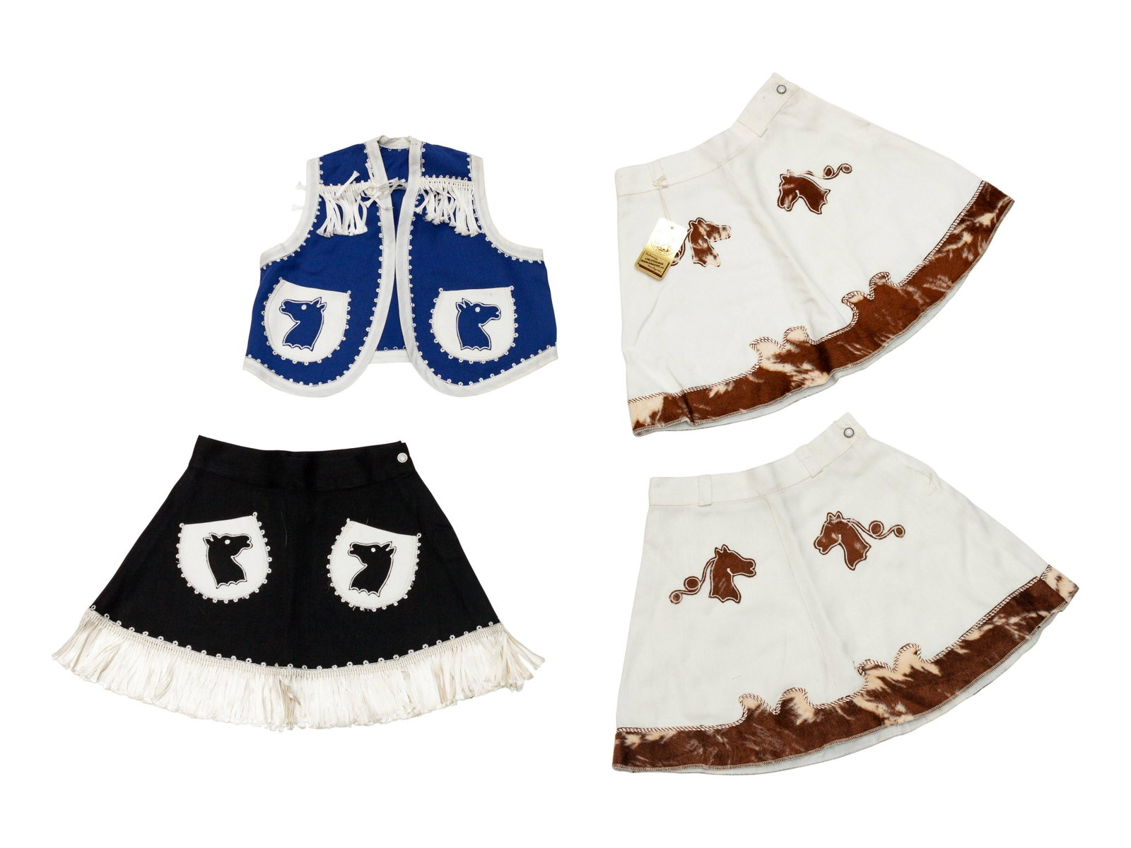 Four Pieces of H Bar C Girl's Rodeo Wear: Four Pieces of H Bar C Girl's Rodeo Wear Three Girl's Rodeo Skirts with Fringe, and one Girl's Rodeo Vest