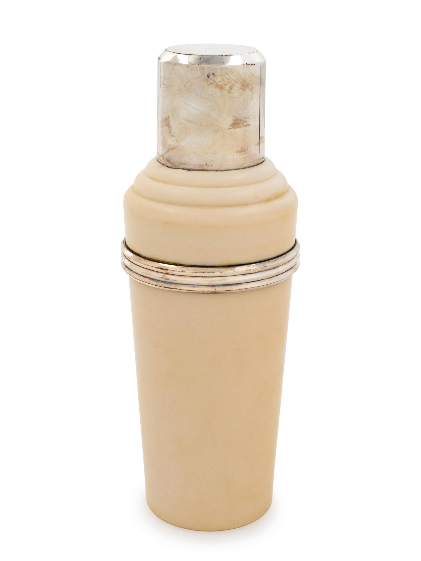 An English 'Master Incolor' Cocktail Shaker: An English 'Master Incolor' Cocktail Shaker Circa 1930 marked 'Patents Pending', 'The Master Incolor Cocktail Shaker', and 'Made in England' on underside Height 11 inches. Property from the Collection