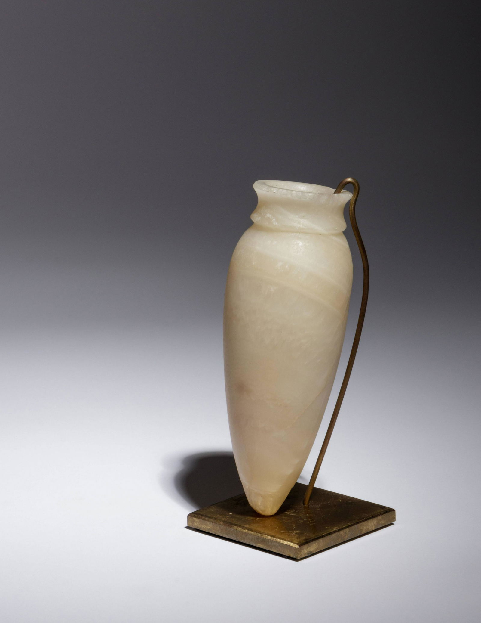 An Egyptian Alabaster Vessel Height 5 3/8 inches. (1 of 2)