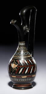 An Apulian Gnathian Ware Prochous Height 8 inches.: An Apulian Gnathian Ware Prochous Circa 330-310 B.C. Height 8 inches. Provenance: Acquired from Robert Peters, PhD, New York, in the 1980s. Property from the Collection of Michael Minick, New York