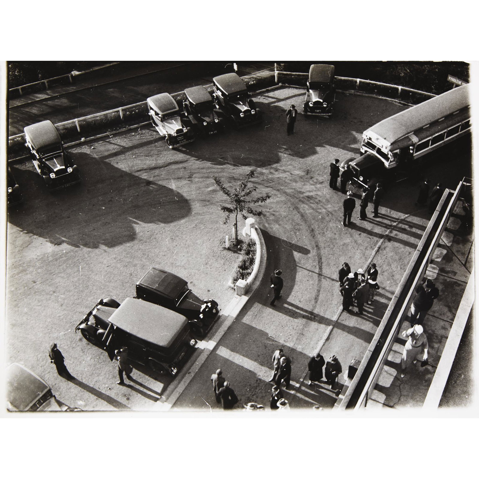 [Photography] Lauschmann, Jan (Czech, 1901-91), Group: [Photography] Lauschmann, Jan (Czech, 1901-91)Group of 2 PhotographsOutdoor Cafe1933. Gelatin silver print. Signed, titled, and dated in ink on verso. Image/sheet: 12 1/8 x 11 1/2 in. (308 x 292 mm).T