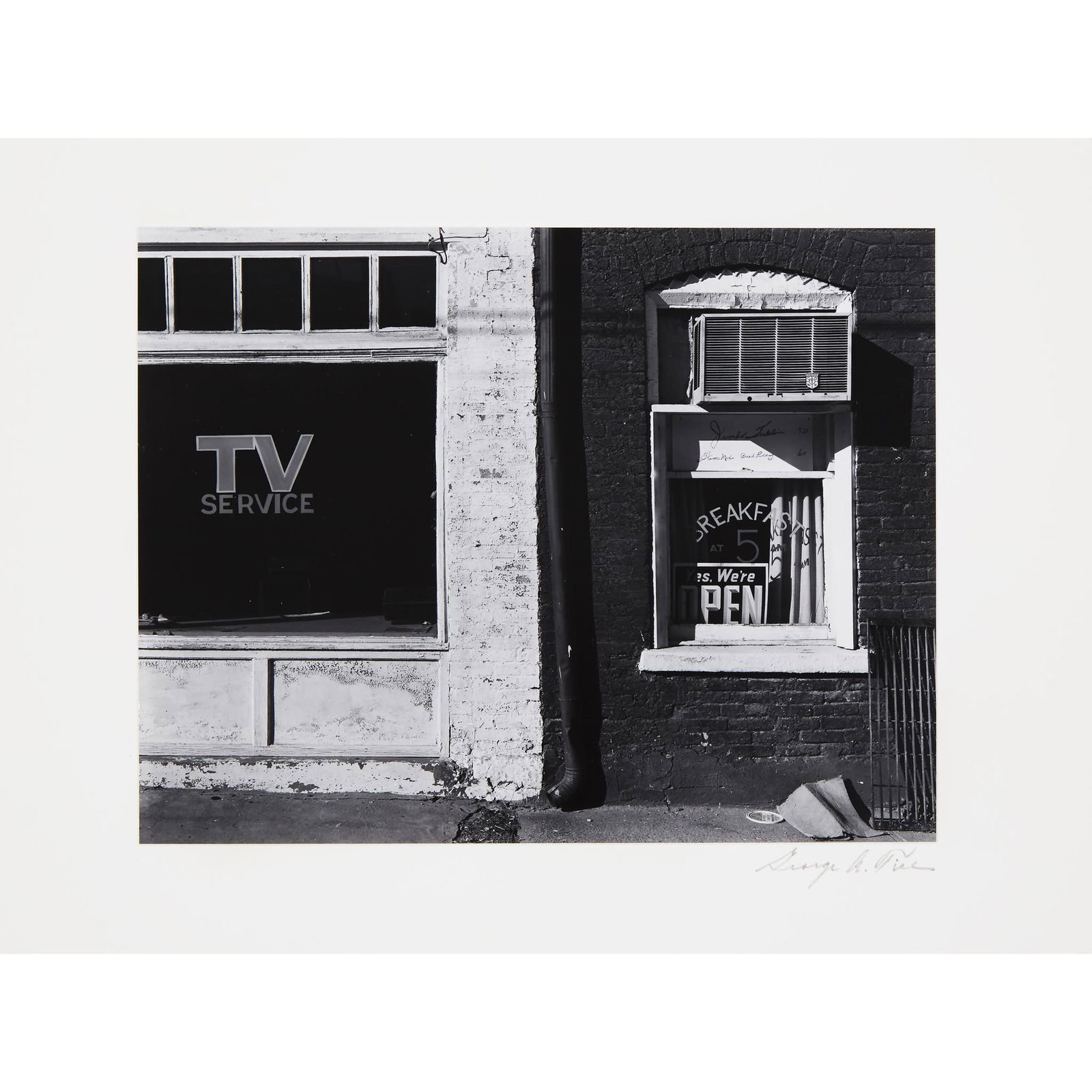 [Photography] Tice, George (American, b. 1938),: [Photography] Tice, George (American, b. 1938)Virginia's Place, Hannibal, Missouri1982, printed 11/27/92. Selenium-toned gelatin silver print mounted on board. Signed in pencil on board below image, a