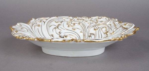 A Meissen Porcelain Bowl, Width 12 5/8 inches.: A Meissen Porcelain Bowl, of shaped oval form with gilt decoration having crossed swords mark in underglaze blue. Width 12 5/8 inches.