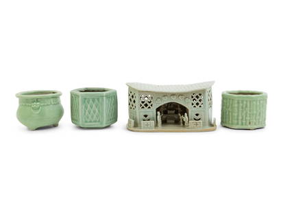 Four Chinese Celadon Glazed Articles: Four Chinese Celadon Glazed Articles 19TH-20TH CENTURY comprising one tripod incense burner, one hexagonal censer, one bamboo relief censer, and a porcelain pillow with modelled figures. Length of lar