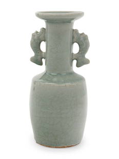 A Chinese Celadon Glazed Porcelain Double Handled Vase: A Chinese Celadon Glazed Porcelain Double Handled Vase the slightly tapering cylindrical body rising from a recessed base to an angled shoulder and cylindrical neck with a broad dished mouth, set at