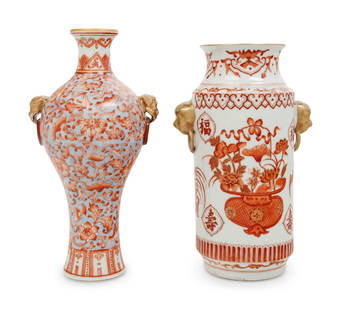 Two Chinese Iron Red Decorated Porcelain Vases: Two Chinese Iron Red Decorated Porcelain Vases the first of Meiping shape with a long neck, decorated with bats and lotus scrolls against a spotted ground, the second a cylindrical vase, painted with