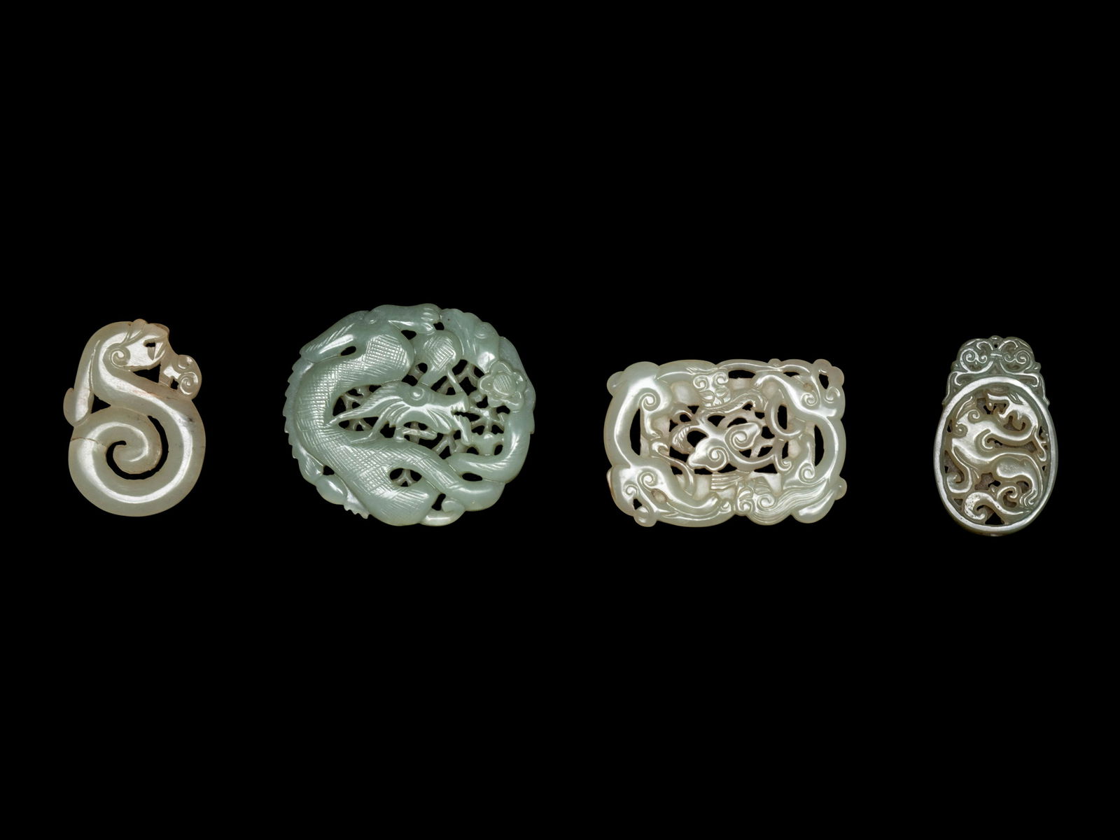 Four Chinese Celadon Jade Pendants (1 of 2)