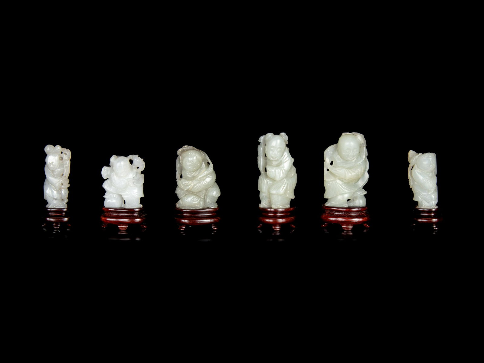Six Chinese Carved Celadon Jade Figures of Boys (1 of 3)