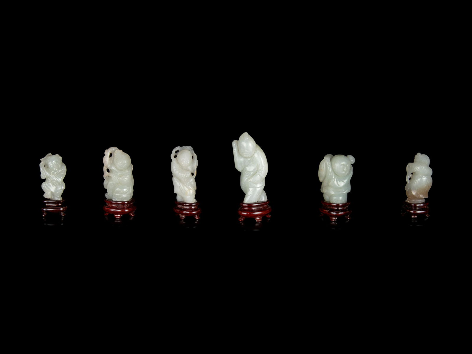 Six Chinese Carved Celadon Jade Figures of Boys (1 of 3)