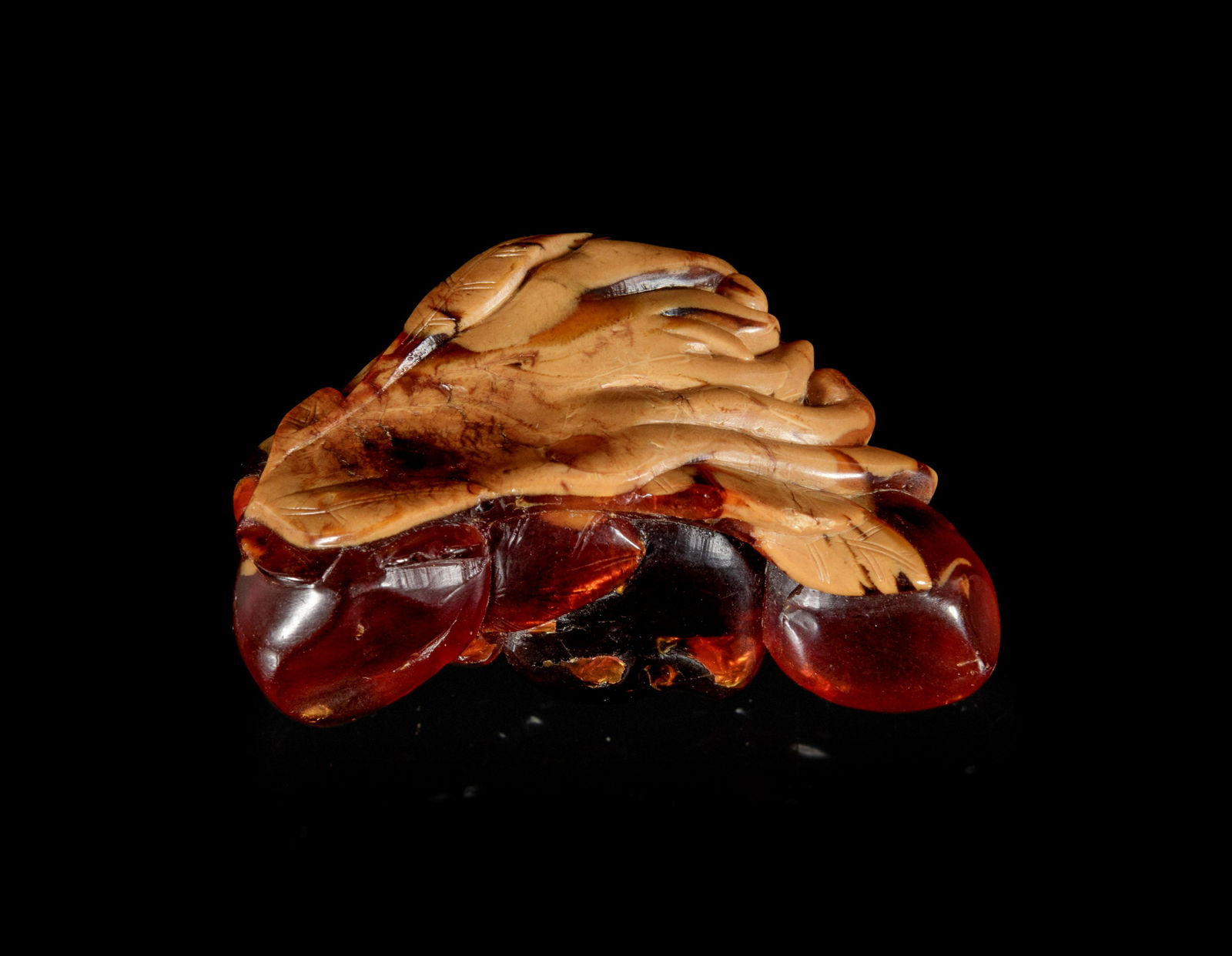 A Carved Amber Hand Citron-Form Snuff Bottle (1 of 3)