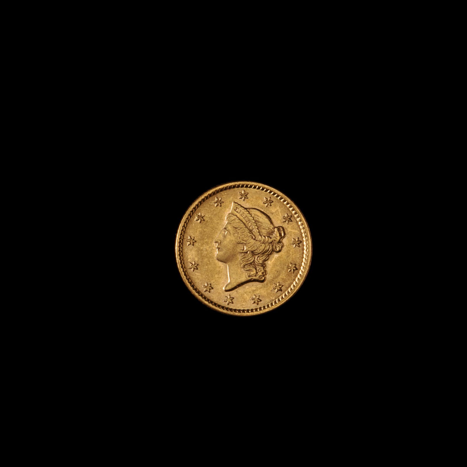 An 1852 Liberty Head: Type 1 $1 Gold Coin (1 of 2)