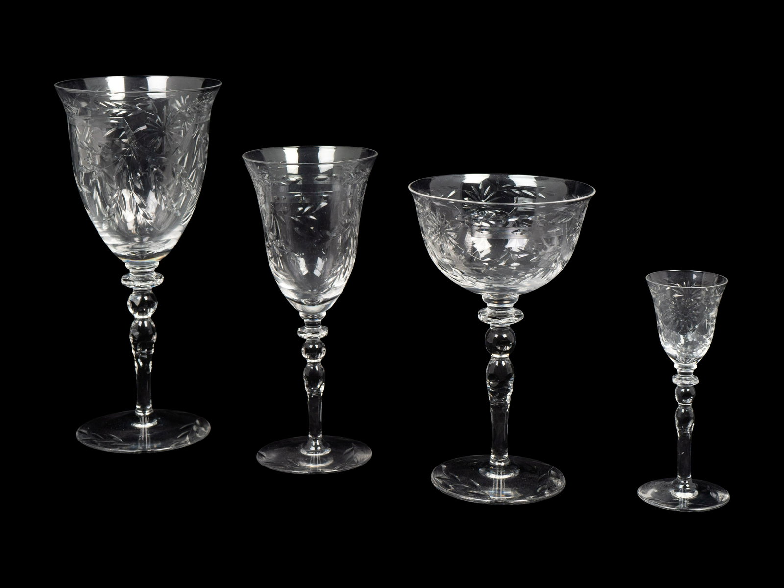 An American Cut-Glass Part Stemware Service: An American Cut-Glass Part Stemware Service FIRST HALF 20TH CENTURY Comprising: 11 water goblets 15 wine glasses 15 champagne coupes 11 sherries (52 pieces) Property from a Michael Simon Designed Inte