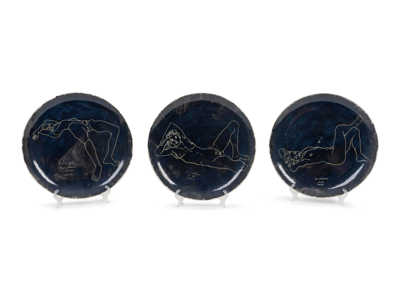 Robert Graham (American, 1938-2008) Nudes, 2000: Robert Graham (American, 1938-2008) Nudes, 2000 glazed ceramic each signed R. Graham and dated 10.28.2000. Diameter 9 3/4 inches.