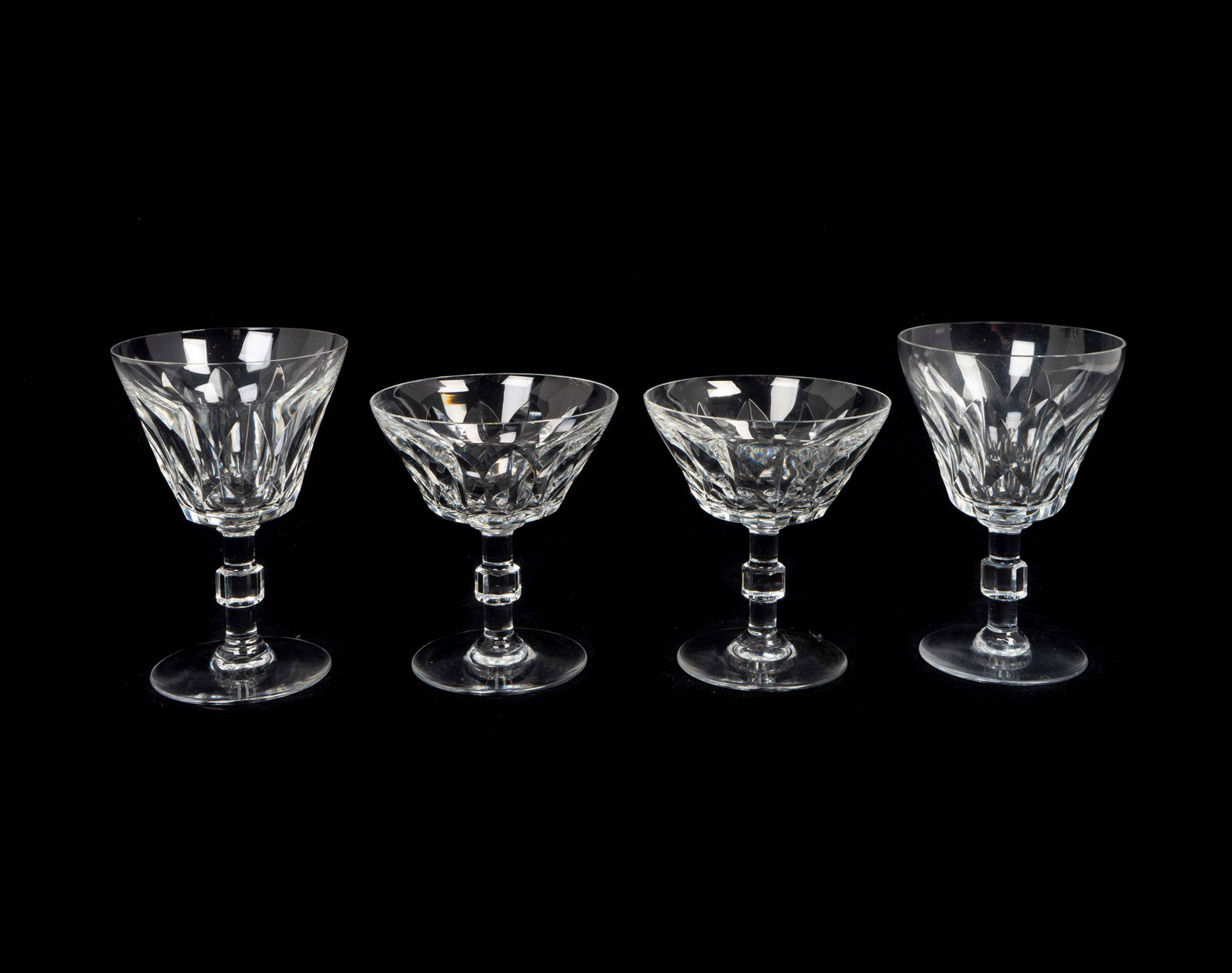 A Baccarat Glass Part Stemware Service in the Caracas: A Baccarat Glass Part Stemware Service in the Caracas Pattern Comprising: 11 water glasses 11 port wine glasses 4 sherries 12 champagne coupes (38 pieces) Property from the Collection of a Parisian La