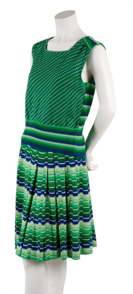 A Missoni Green and Blue Striped Two Piece Ensemble, Size 48.: A Missoni Green and Blue Striped Two Piece Ensemble, 1980s, sleeveless top with a square neckline, three different knitted patterns within top and skirt, wide waistband with a pleated skirt. Labeled: