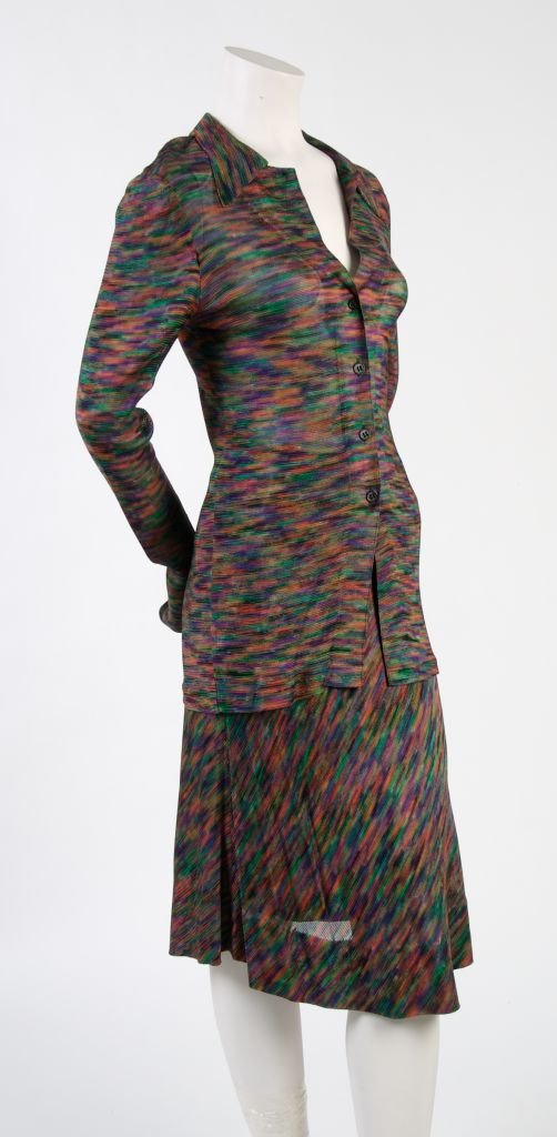 A Missoni Multicolor Ikat Sweater with Matching Skirt, Size 46.: A Missoni Multicolor Ikat Sweater with Matching Skirt, 1980s, sweater with full length sleeves, notch collar, center front button closure, fitted, with a flared knee length skirt. Labeled: Missoni. Si