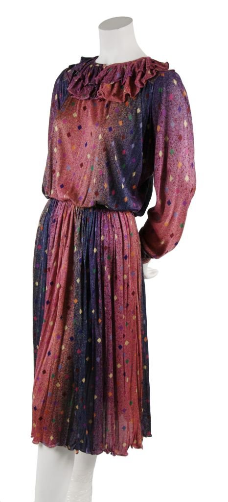 A Missoni Multicolored Day Dress, Size M.: A Missoni Multicolored Day Dress, 1980s, peep-hole neckline with two layers of ruffles, cinched waist, full knee length skirt. Labeled: Missoni. Size M.
