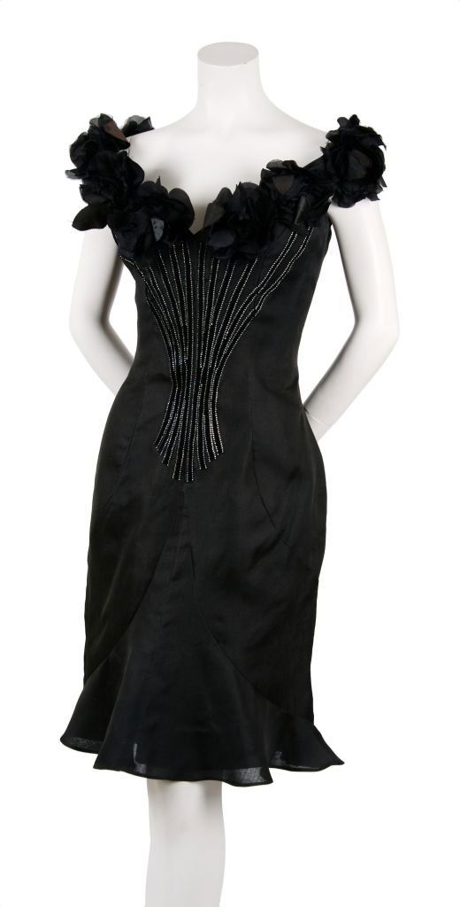 A Murray Arbeid Black Organza Bouquet Dress,: A Murray Arbeid Black Organza Bouquet Dress, trimmed in flower appliques at neckline, rhinestone bodice at front and black to look like flower stems, flared hemline, fully lined. Labeled: Murray Arbei