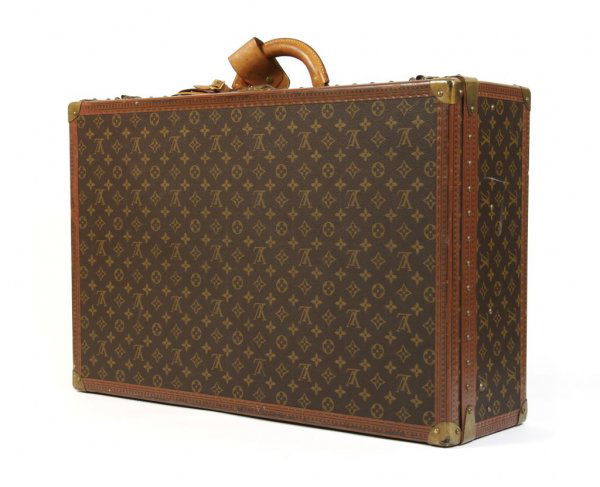 A Louis Vuitton Medium Monogram Canvas Train Case, 28 x 8 x 18 inches.: A Louis Vuitton Medium Monogram Canvas Train Case, circa 1970s, with original key. Stamped: Louis Vuitton. 28 x 8 x 18 inches.