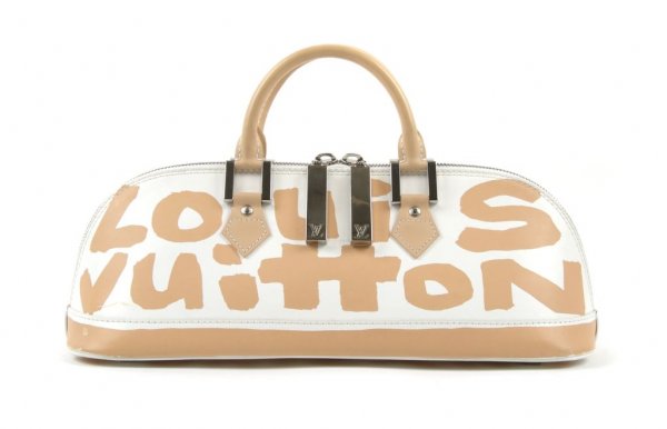 A Stephen Sprouse for Louis Vuitton Graffiti Bag, 17 x 6 inches.: A Stephen Sprouse for Louis Vuitton Graffiti Bag, white leather with tan graffiti, in an oblong shape with two tan leather handles. Stamped: Louis Vuitton. 17 x 6 inches.