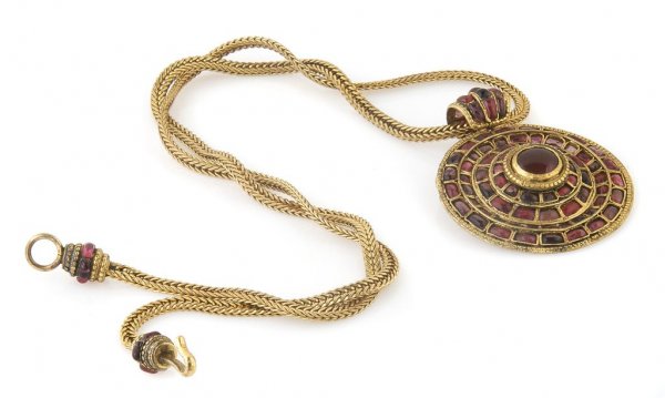 A Chanel Gripoix Red Byzantine Disk Pendant with Necklace,: A Chanel Gripoix Red Byzantine Disk Pendant with Necklace, circa 1970s, Stamped: Chanel.