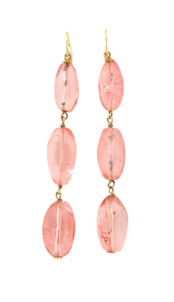 A Pair of Yves Saint Laurent Couture Rose Quartz Earrings,: A Pair of Yves Saint Laurent Couture Rose Quartz Earrings, with three drop down stones.