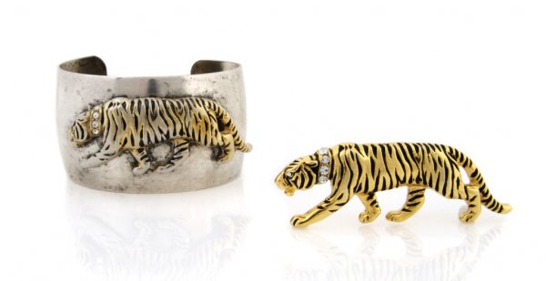 A Kenneth Jay Lane Cuff with Matching Pin,: A Kenneth Jay Lane Cuff with Matching Pin, in silvertone with an attached tiger at center. Pin is goldtone tiger with rhinestone collar. No stamp.