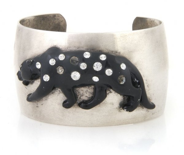 A Kenneth Jay Lane Cuff,: A Kenneth Jay Lane Cuff, in silver tone with an attached rhinestone black jaguar at center. No stamp.