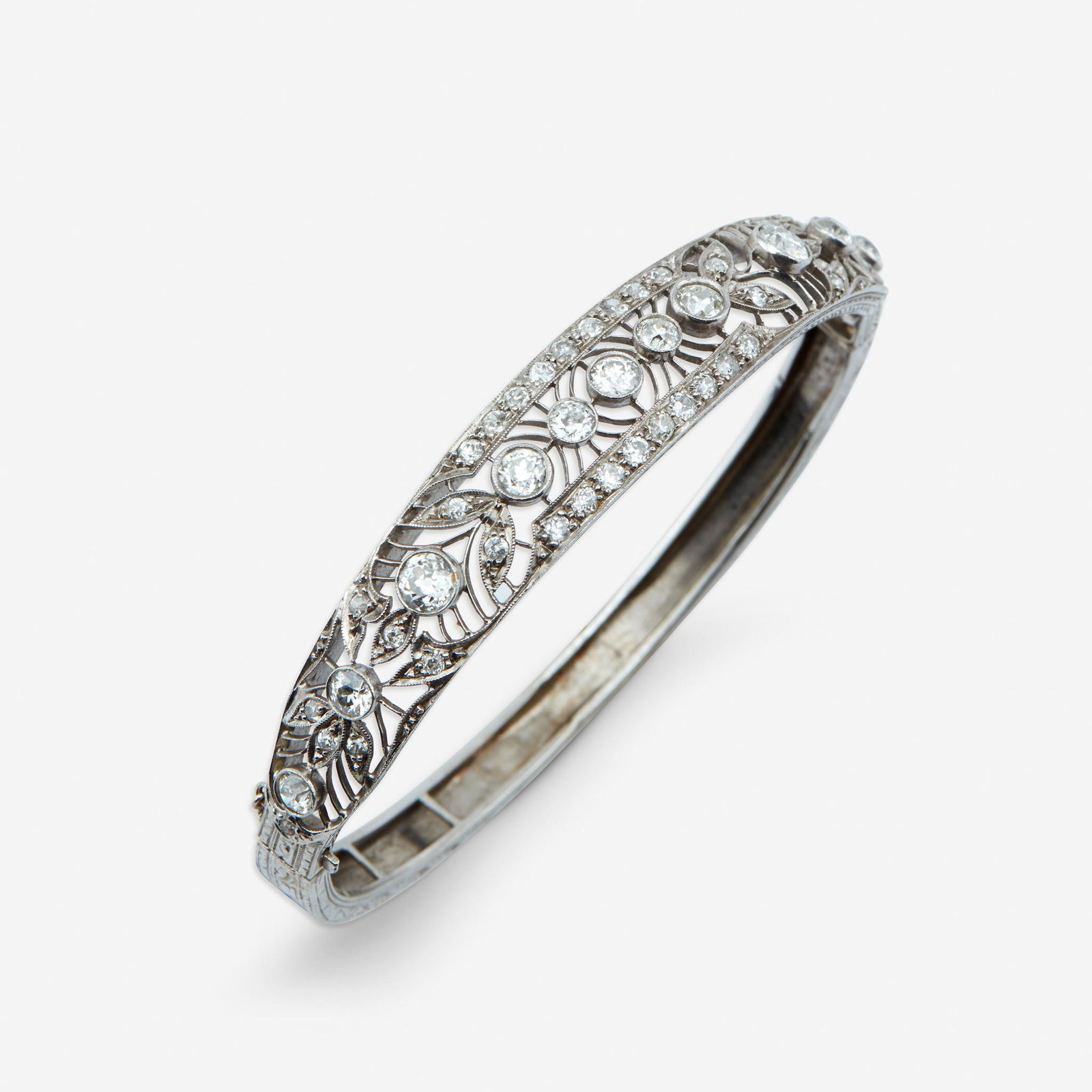 A diamond and eighteen karat white gold bangle, (1 of 1)