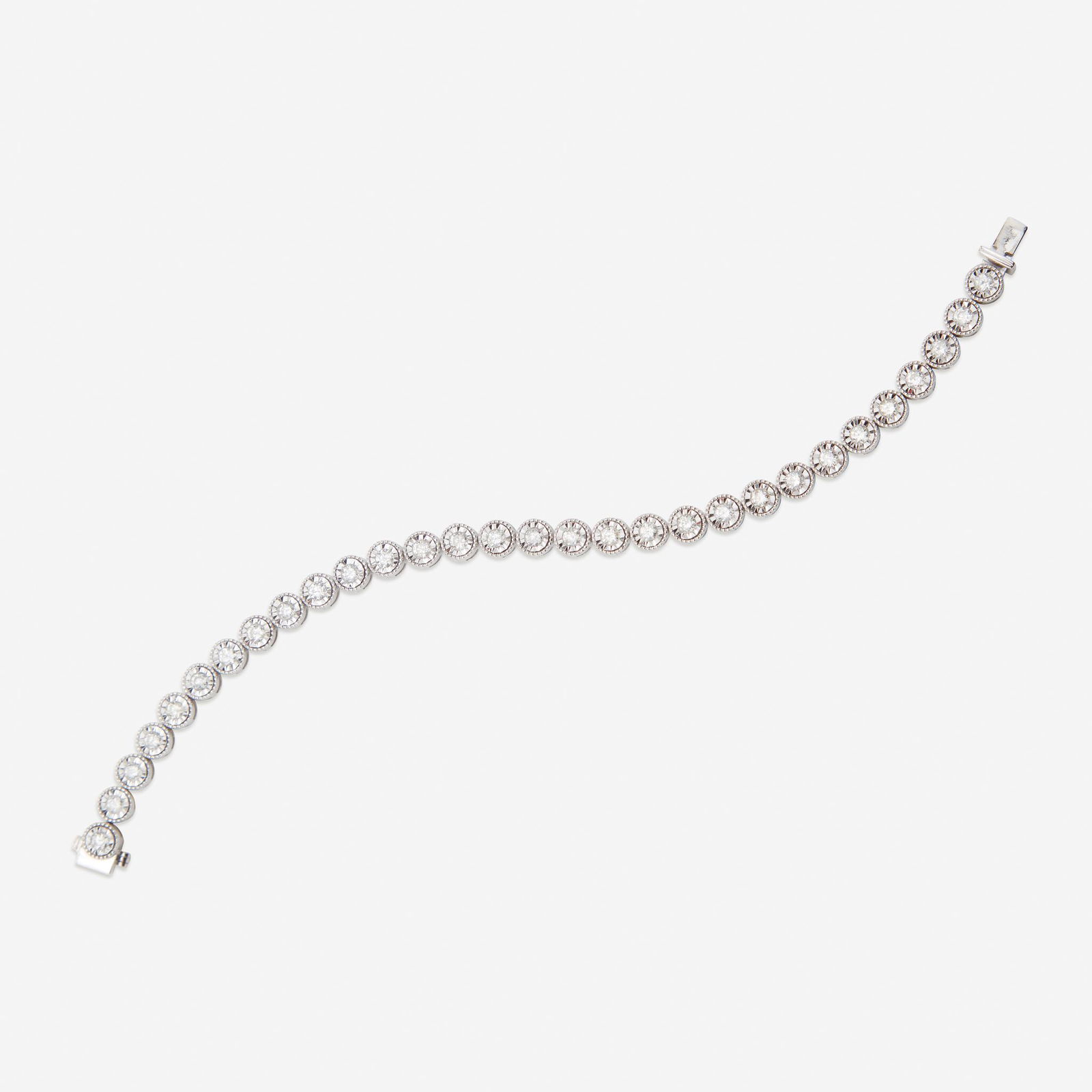 A diamond and fourteen karat white gold line bracelet, (1 of 1)