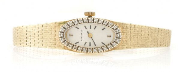 A 14 Karat Yellow Gold and Diamond Wristwatch, Longines: A 14 Karat Yellow Gold and Diamond Wristwatch, Longines, with gold oval dial, baton numerals and black hands,