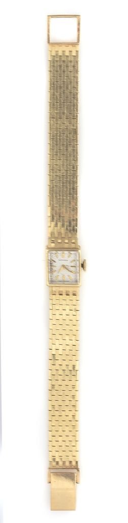 A 14 Karat Yellow Gold Wristwatch, Movado,: A 14 Karat Yellow Gold Wristwatch, Movado, with small square white dial, gold baton numerals, 17 jewel movement, movement stamp: FACTORIES MOVADO SWISS.; inside case stamp: U.S.A. MOVADO 14K GOLD 4X5F