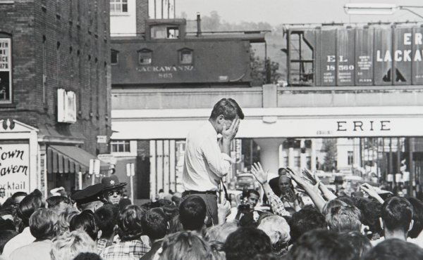 Cornell Capa, (American, 1918-2008), Robert F. Kennedy,: Cornell Capa (American, 1918-2008) Robert F. Kennedy, Buffalo, 1964 gelatin silver print signed, titled and dated (label on reverse) 10 1/2 x 17 inches.