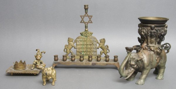 A Collection of Cast Metal Decorative Articles, Height : A Collection of Cast Metal Decorative Articles, comprising a bull dog, child and crown, bronze elephant and menorah. Height of tallest 8 1/4 inches.