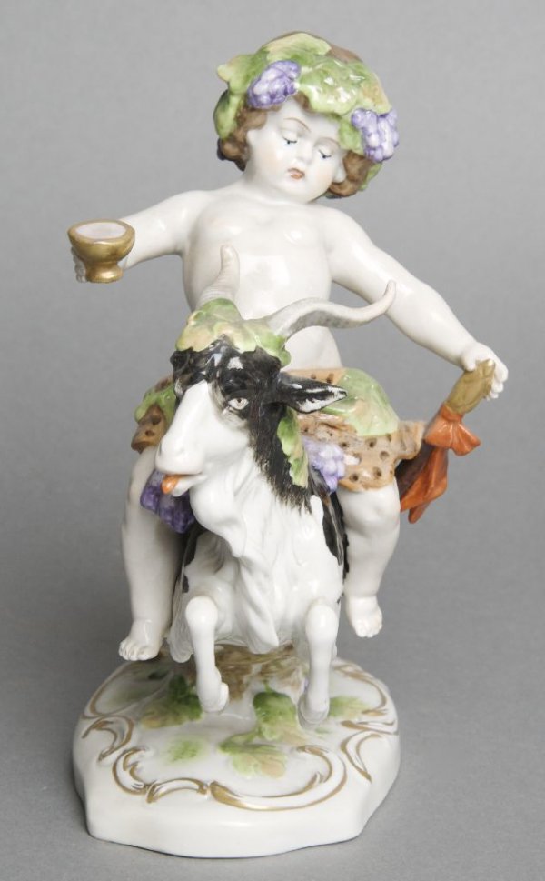 A Capodimonte Figural Group, Height 7 inches: A Capodimonte Figural Group, depicting a child riding a goat, with crowned D mark. Height 7 inches