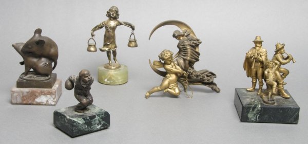 A Collection of Gilt Metal Figural Articles, Height of : A Collection of Gilt Metal Figural Articles, comprising a cold painted bowler, a woman in the moon ornament, a figural group of two mice, a figural group of two musicians with a dancer, a girl with tw