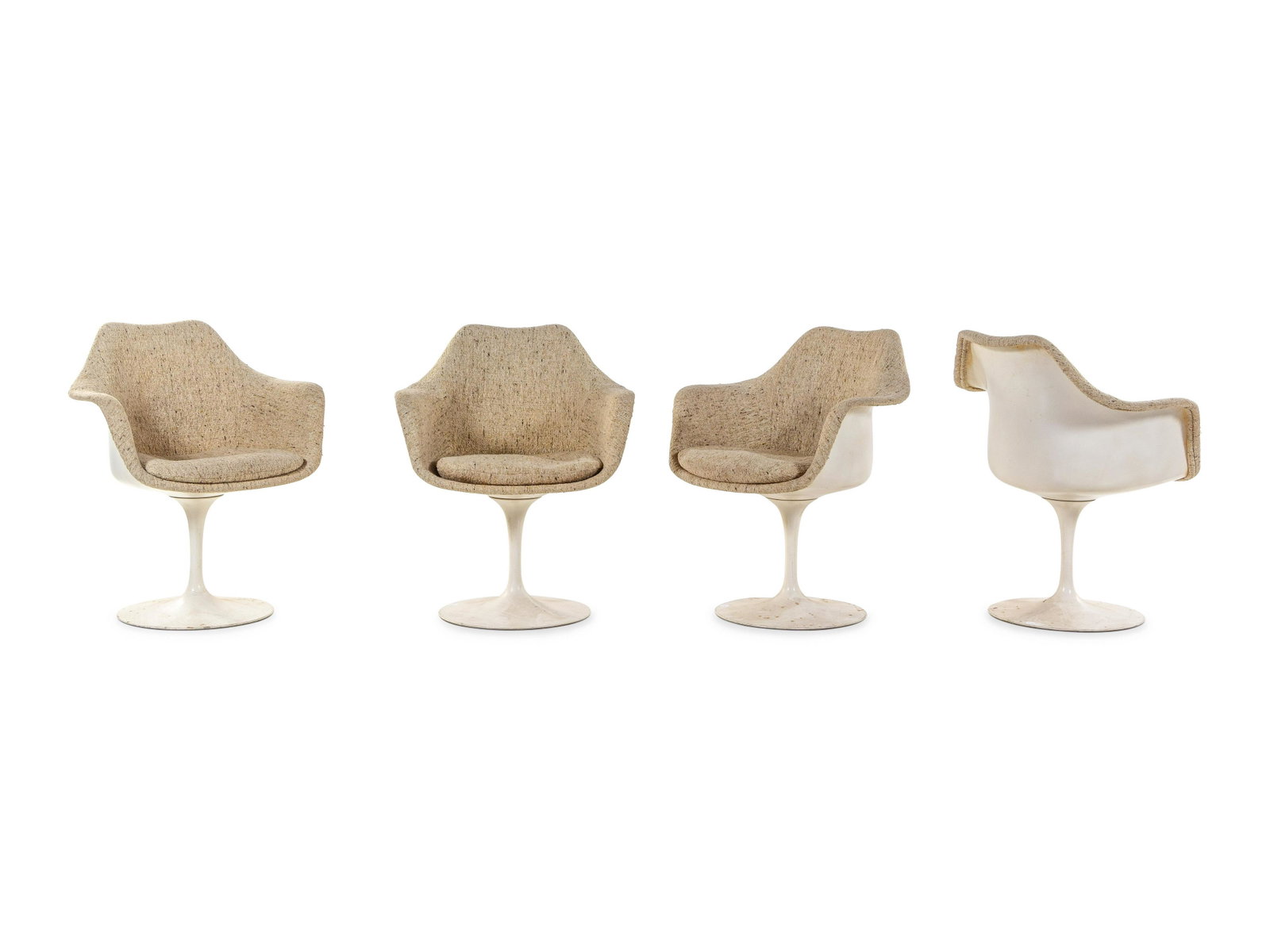 Eero Saarinen (Finnish-American, 1910-1961) Set of: Eero Saarinen (Finnish-American, 1910-1961) Set of FourTulip Armchairs, Knoll USA lacquered fiberglass, enameled aluminum, upholstery H 32 1/4 x W 26 x D 23 inches. Property from a Private Collection,