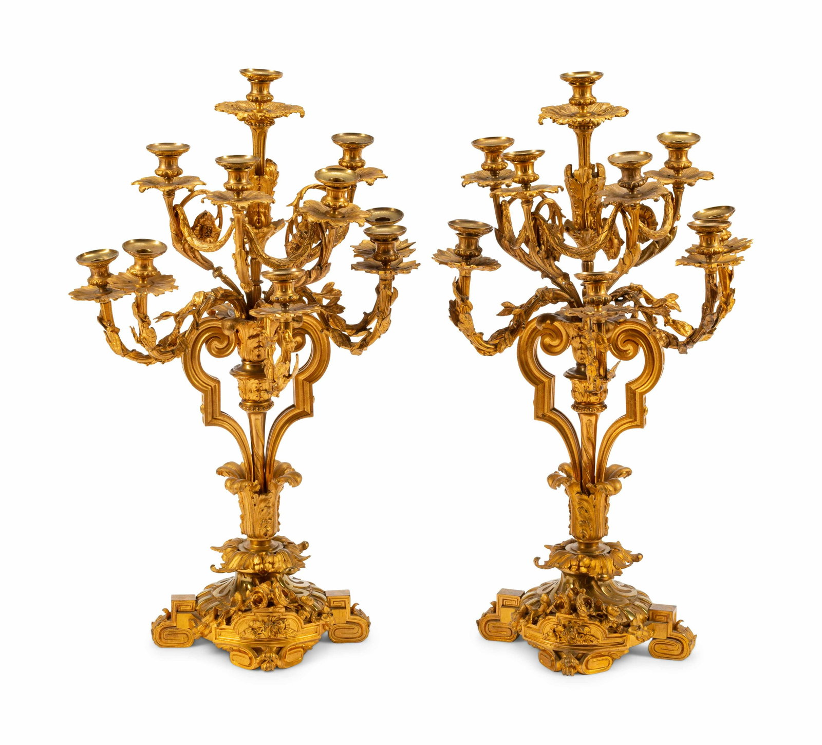 A Pair of Louis XVI Style Gilt Bronze Nine-Light: A Pair of Louis XVI Style Gilt Bronze Nine-Light Candelabra 19th Century Height 36 inches.
