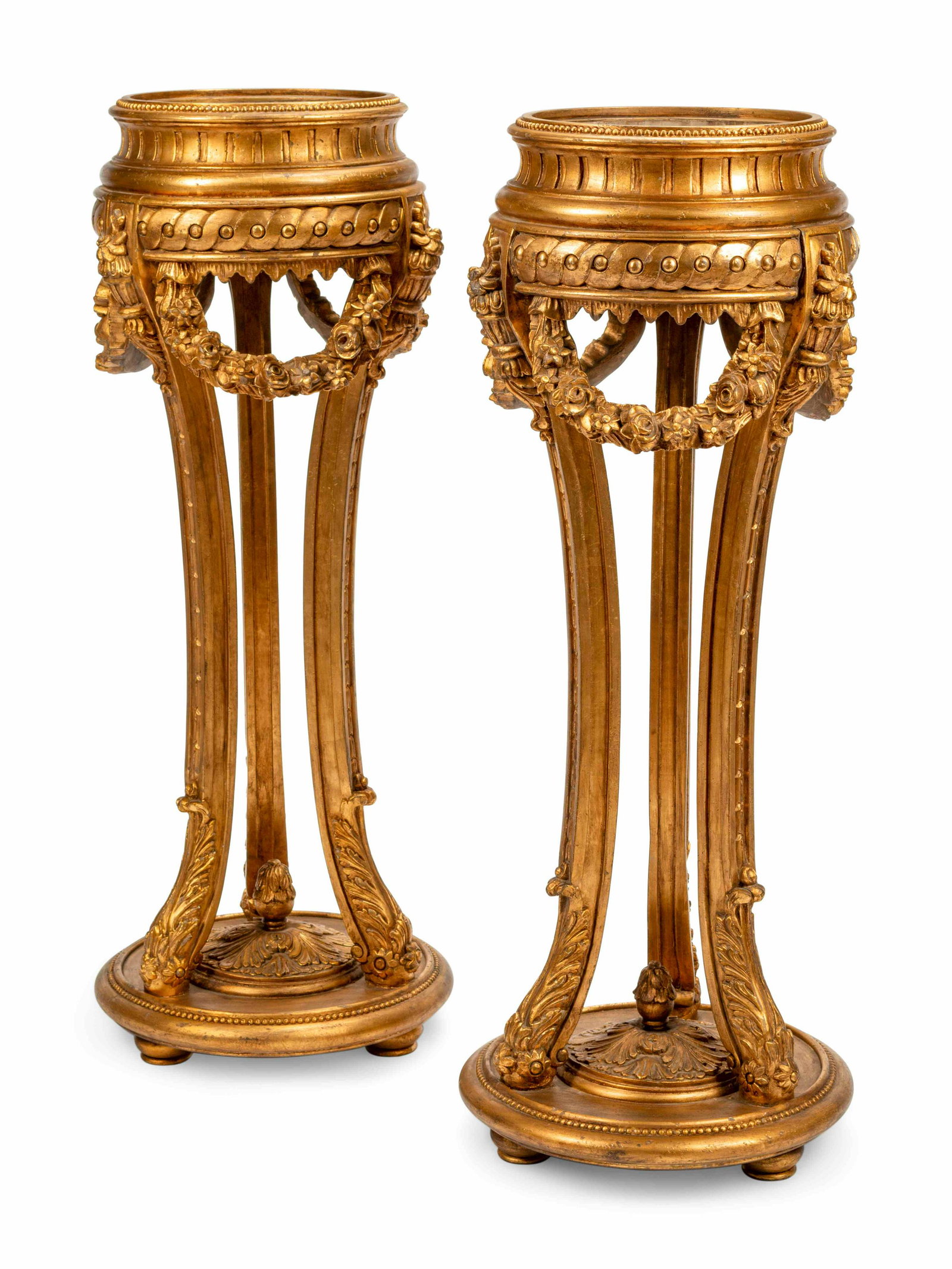 A Pair of Neoclassical Style Giltwood Jardinieres: A Pair of Neoclassical Style Giltwood Jardinieres 20th Century Height 47 inches.