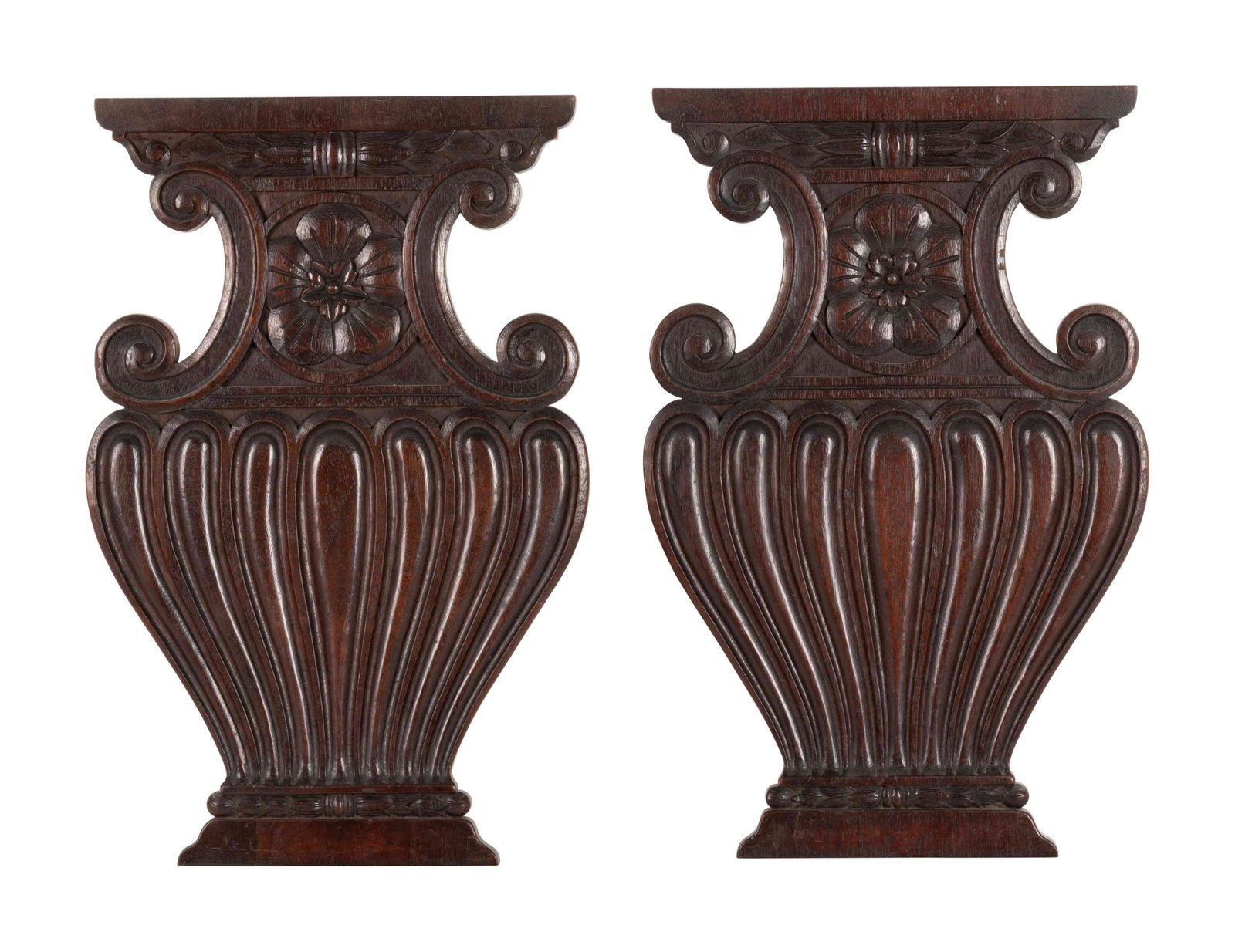 A Pair of Renaissance Revival Carved Walnut Urn-Form: A Pair of Renaissance Revival Carved Walnut Urn-Form Panels 20th Century Height 20 1/2 x width 12 3/4 inches. Property from a Private Collector, Chicago, Illinois