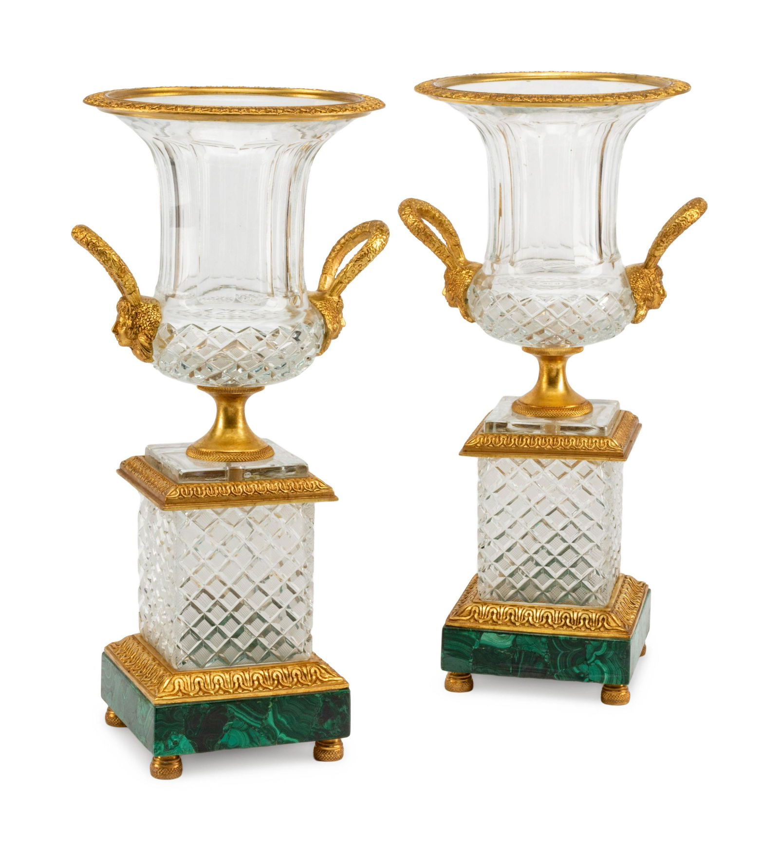 A Pair of Gilt Metal Mounted Cut Glass and Malachite: A Pair of Gilt Metal Mounted Cut Glass and Malachite Urns 20th Century Height 20 x width 10 x depth 9 inches.