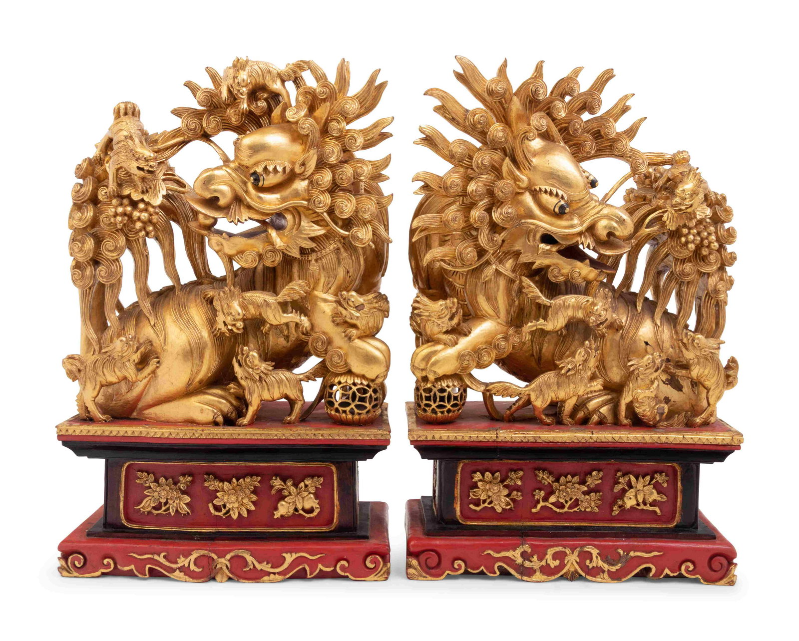 A Pair of Chinese Carved Giltwood Ornaments: A Pair of Chinese Carved Giltwood Ornaments Height 17 x width 11 x depth 6 inches.