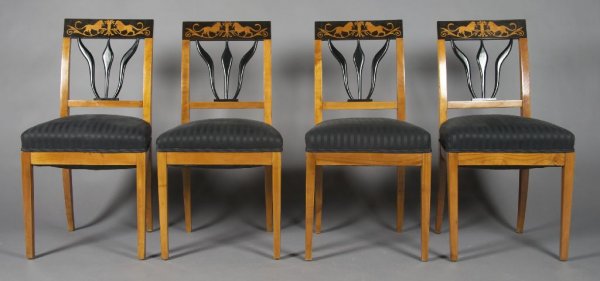 A Set of Four Scandinavian Satinwood Side Chairs, H: A Set of Four Scandinavian Satinwood Side Chairs, having rectangular back with stenciled ebonized decoration of two lions with scrolling floral decoration. Height 35 inches.