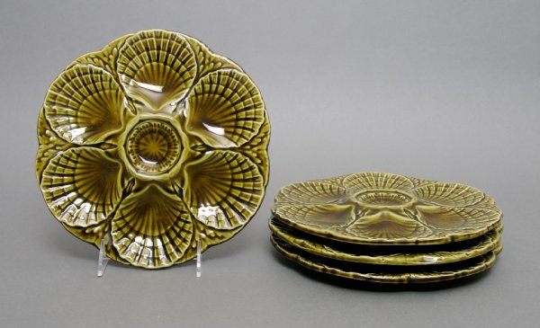 A Set of Twelve Sarreguemines Oyster Plates, Diame: A Set of Twelve Sarreguemines Oyster Plates, each with shell decoration, marked Sarreguemines, France. Diameter 9 1/4 inches.