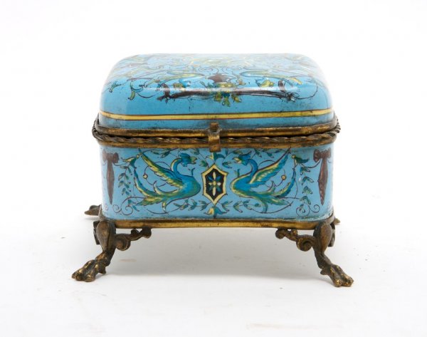 A French Enameled Table Casket, Height 4 1/4 x wid: A French Enameled Table Casket, 19th century, the blue reserve decorated with serpentine figures and scrolling decoration, raised on paw feet. Height 4 1/4 x width 5 1/2 x depth 5 1/2 inches.
