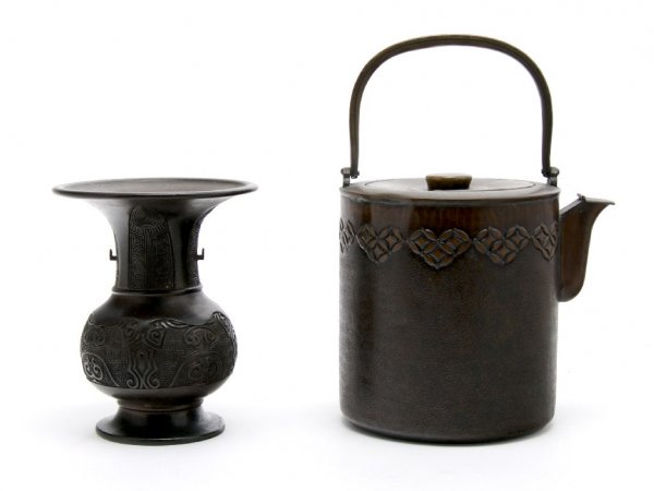 An Asian Archaic Style Bronze Vase, Height of tall: An Asian Archaic Style Bronze Vase, having flared rim with bulbous center, with raised geometric decoration throughout, together with a hammered brass tea kettle, stamped on base. Height of tallest 6 