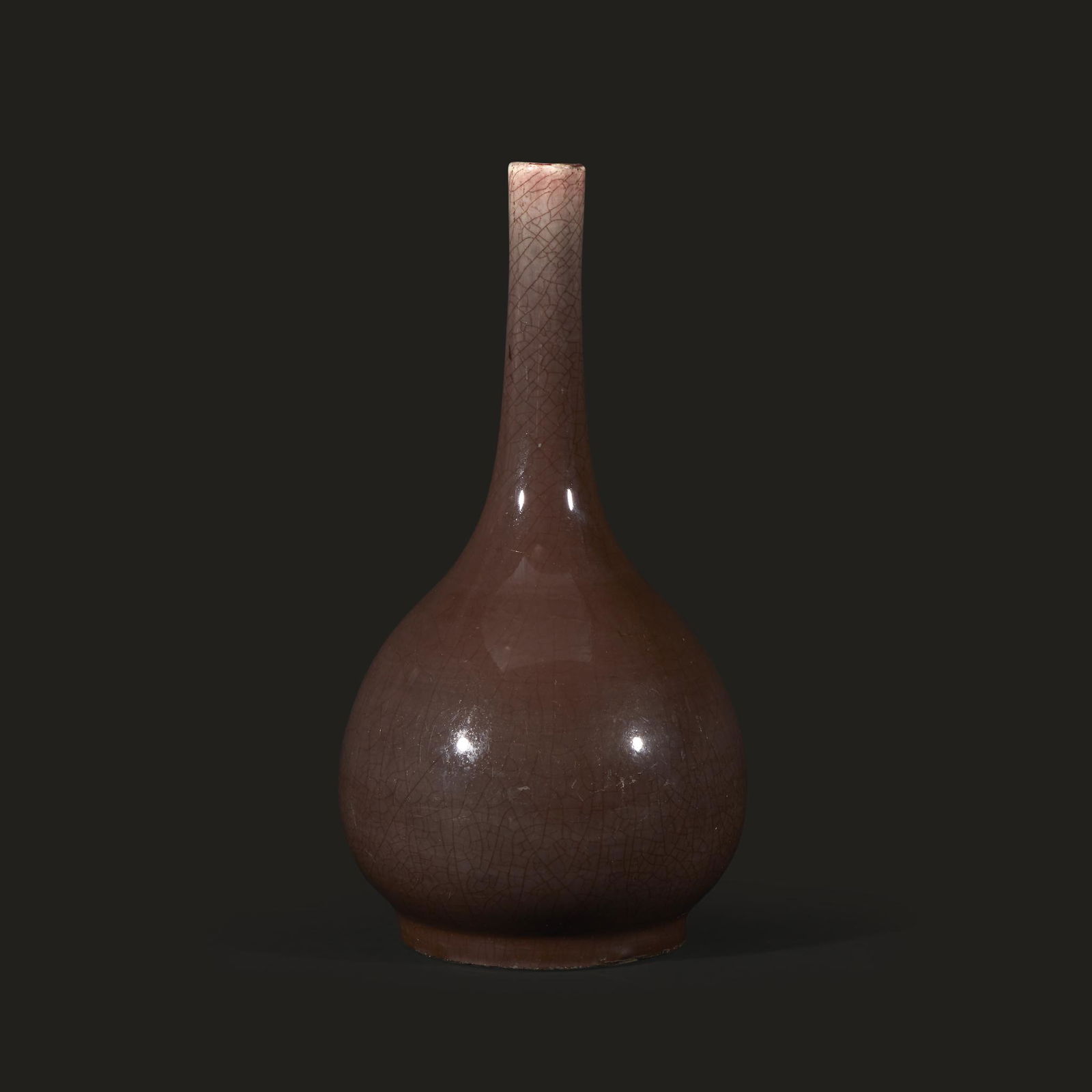 A Chinese copper red-glazed bottle vase, (1 of 2)