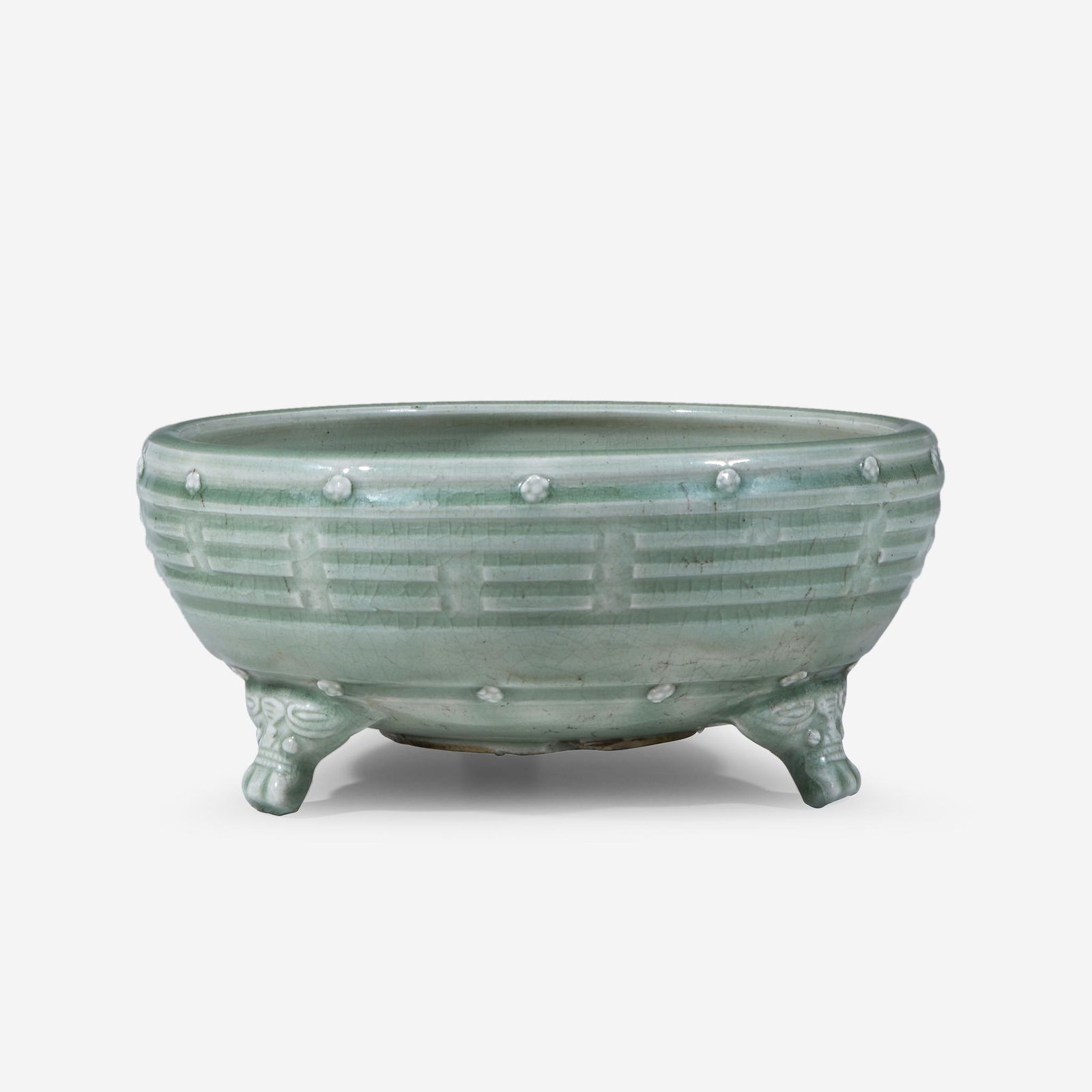 A Chinese Longquan celadon "Trigrams" tripod censer, (1 of 2)