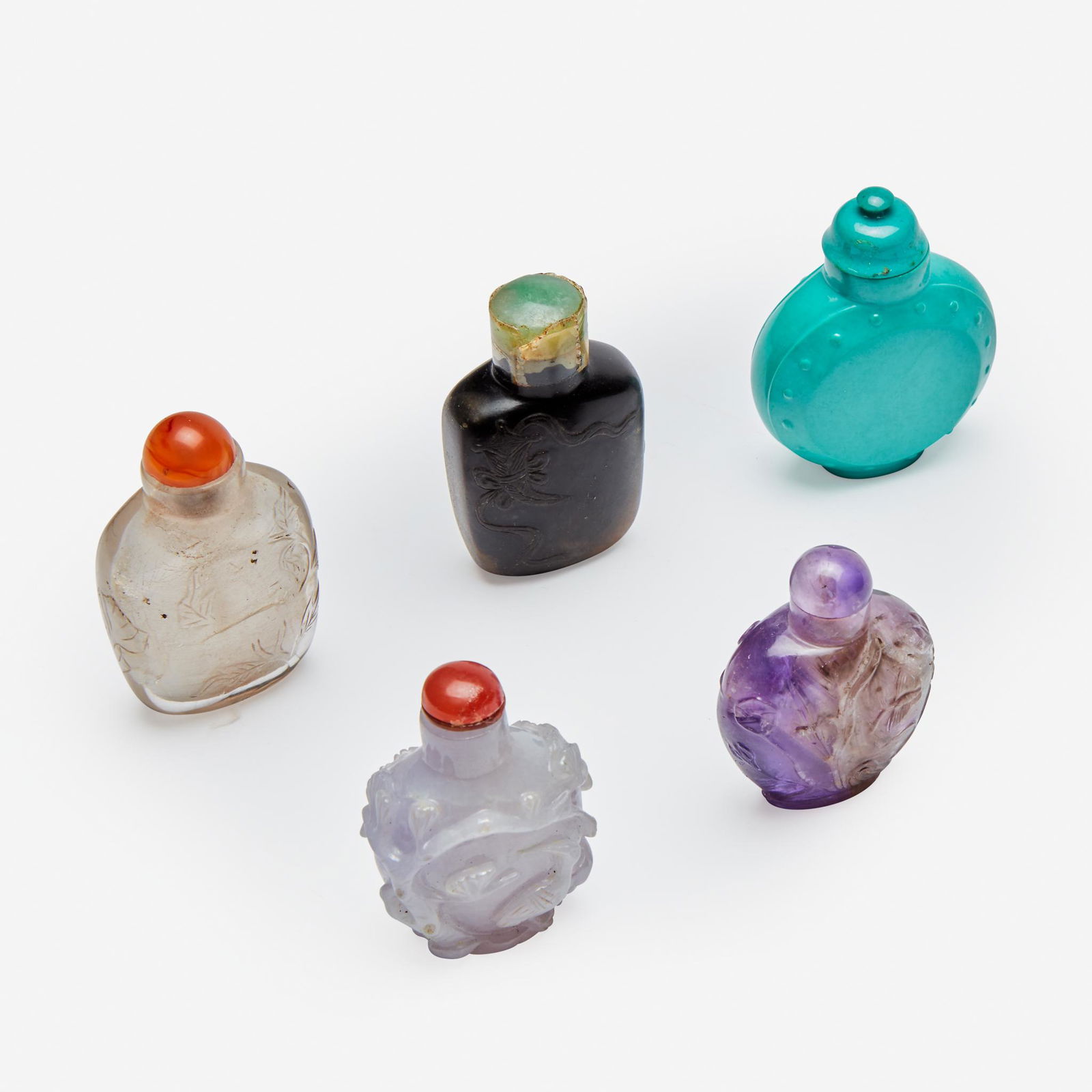 A group of five assorted Chinese carved hardstone snuff (1 of 2)