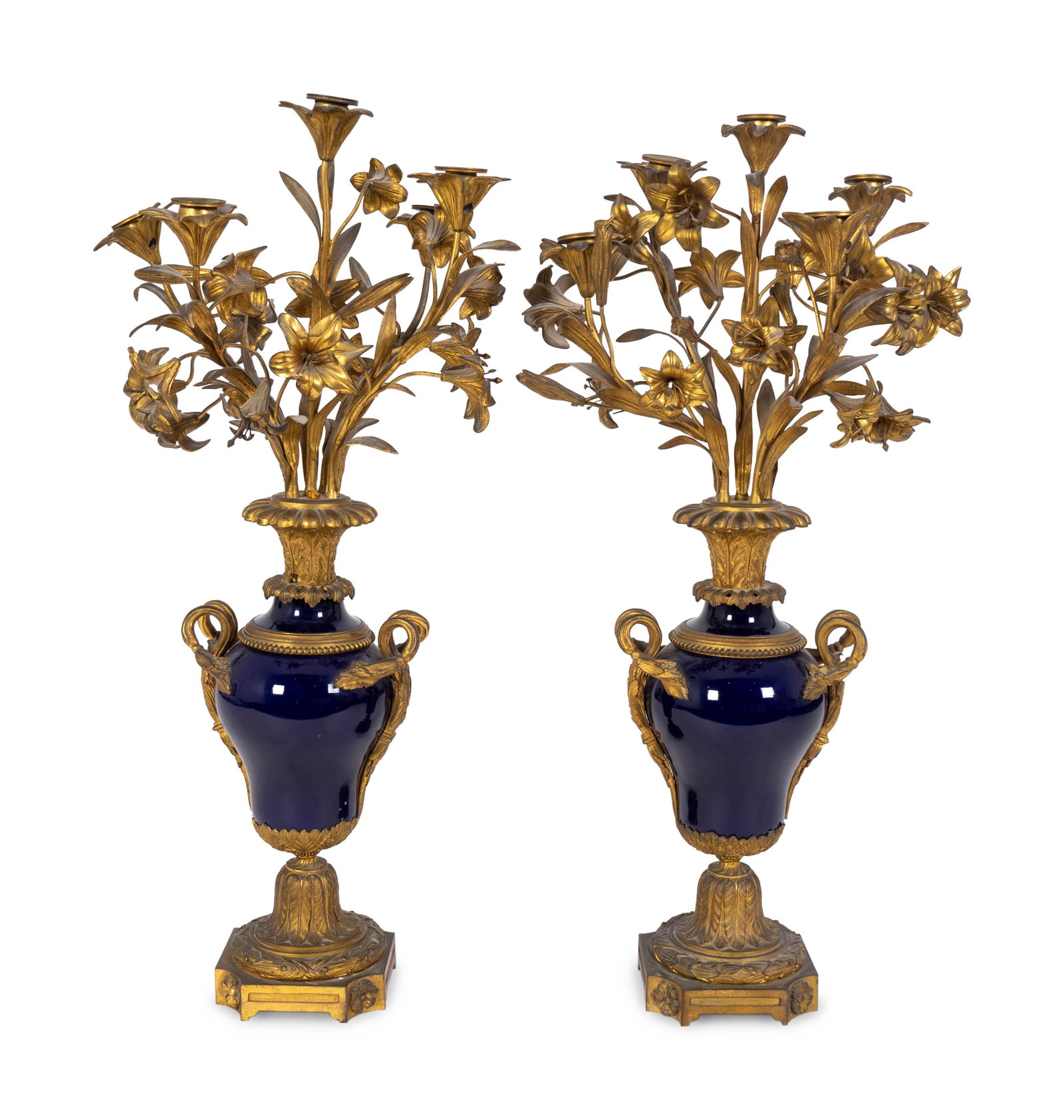 A Pair of Louis XV Style Gilt-Bronze and Cobalt: A Pair of Louis XV Style Gilt-Bronze and Cobalt Blue-Glazed Porcelain Five-Light Candelabra 19TH CENTURY Height 29 inches.